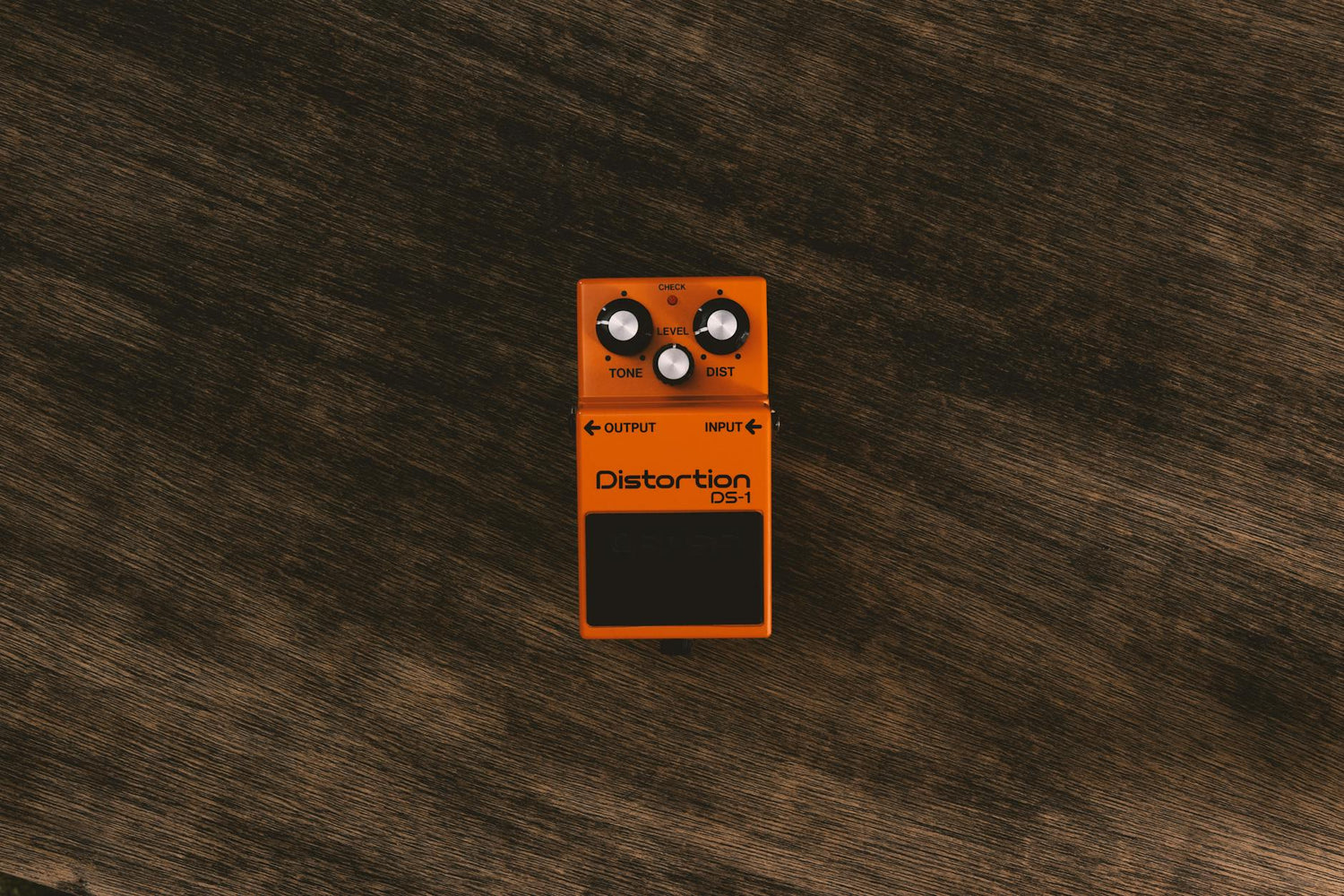Guitar effects pedal board and amp modeling floor unit | Photo by E on Pexels