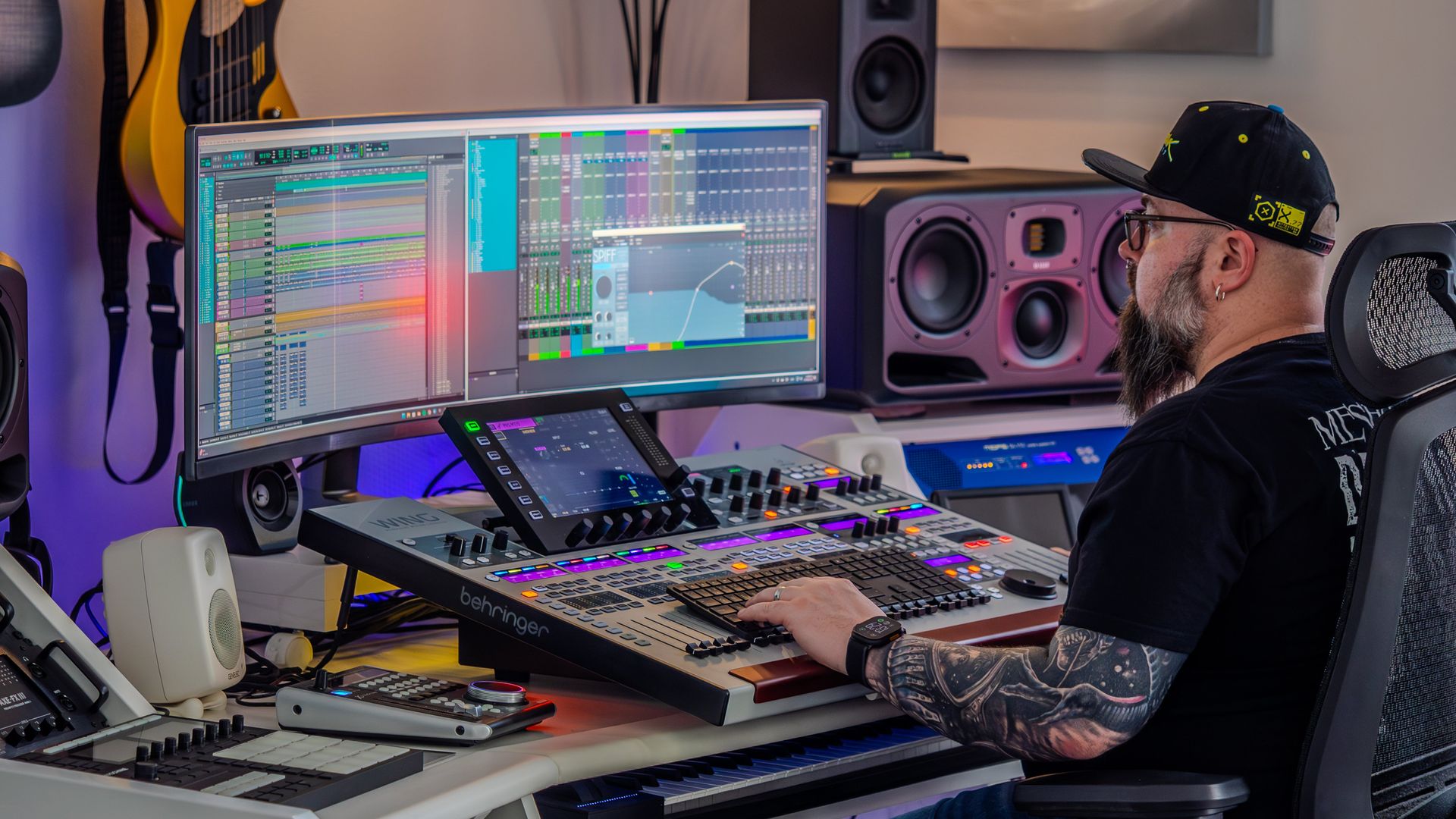 Professional music production studio setup with monitors and equipment