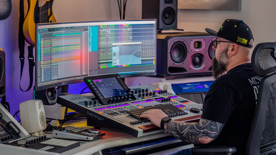 Professional music production studio setup with monitors and equipment